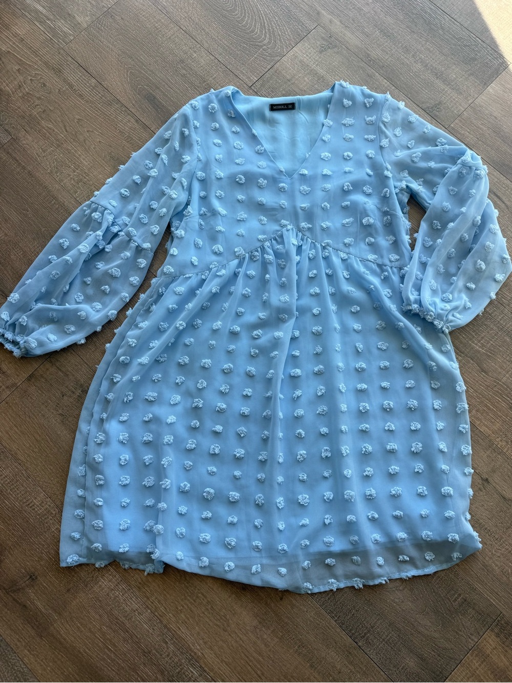 Long sleeve babydoll dress with polka dots